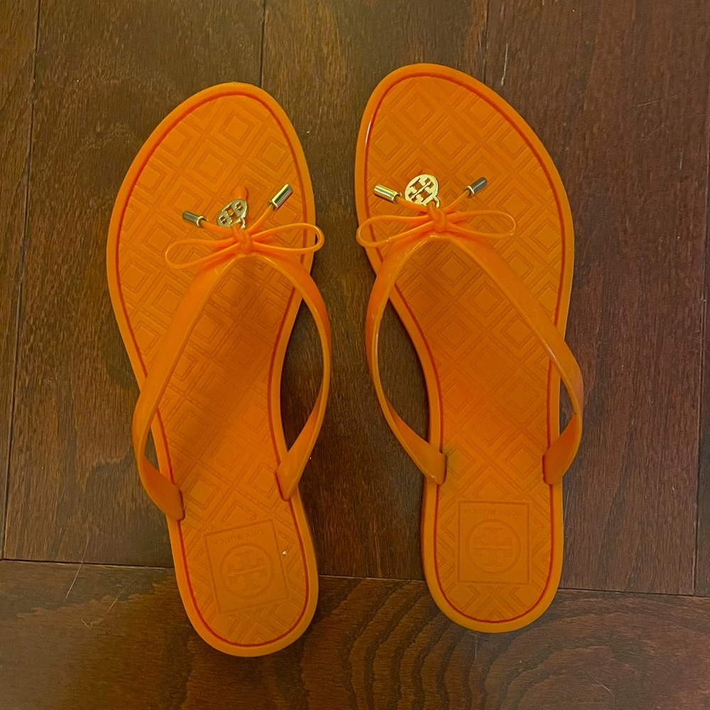 Tory Burch Orange Flip Flops w/ Gold Charm